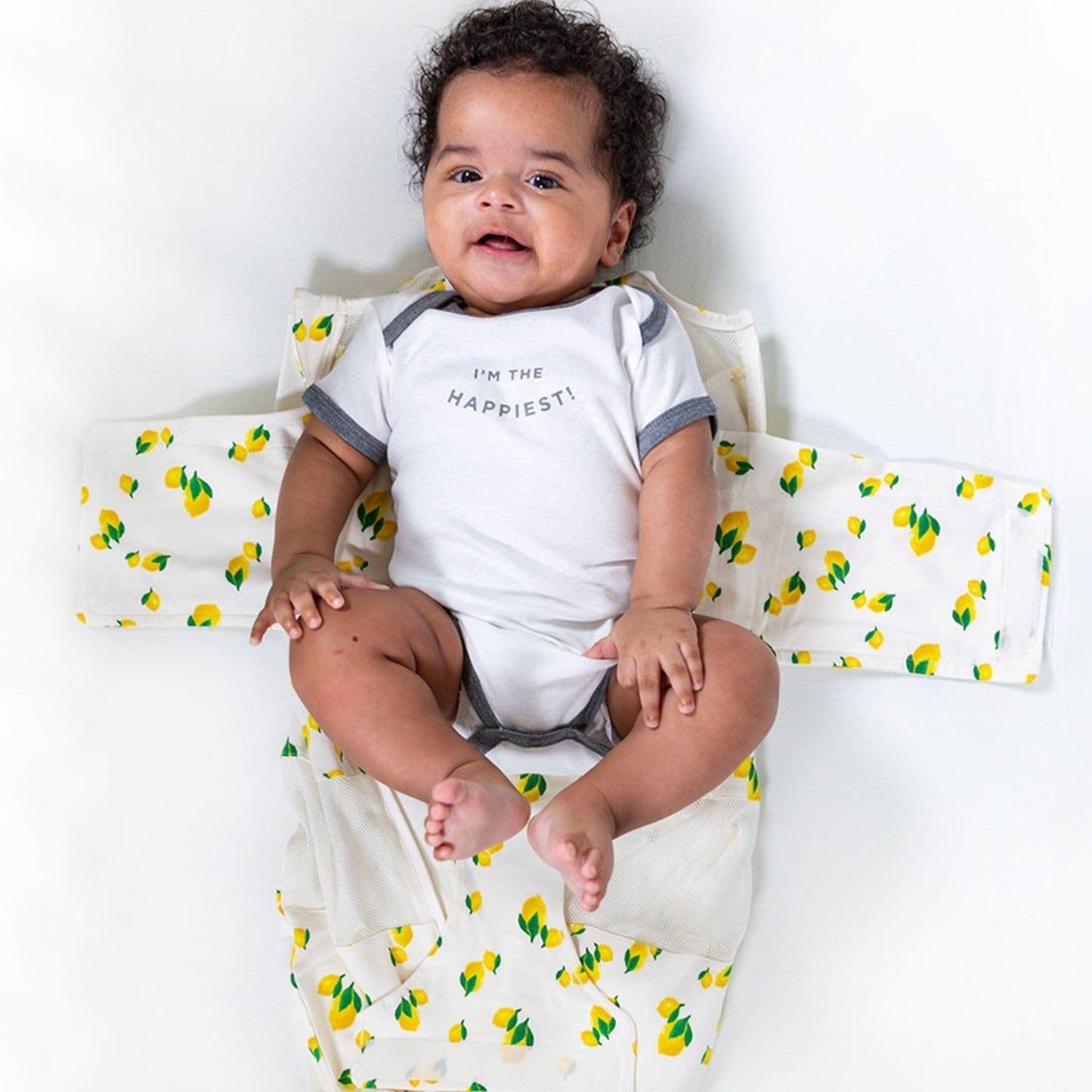 Happiest Baby Sleepea 5-Second Swaddle - Organic Cotton Baby Swaddle Blanket - Doctor Designed Promotes Healthy Hip Development (Ivory Lemons, Medium)