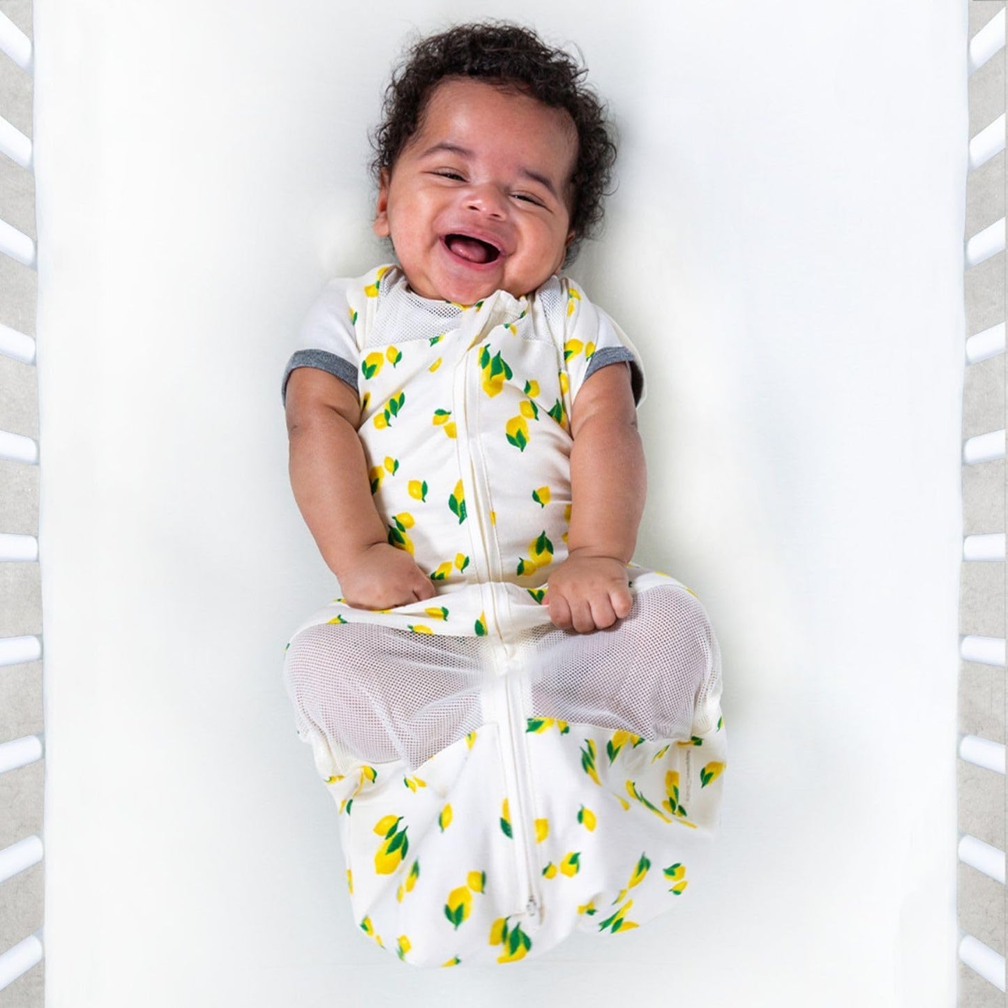 Happiest Baby Sleepea 5-Second Swaddle - 100% Organic Cotton Baby Swaddle Blanket - Doctor Designed Promotes Healthy Hip Development (Ivory Lemons, X-Large)