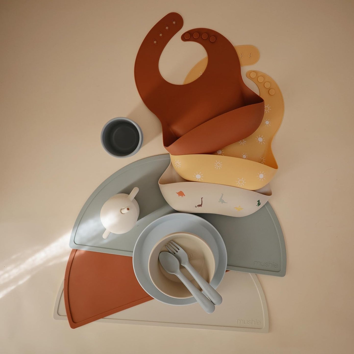 mushie Silicone Baby Bib | Adjustable Fit Waterproof Bibs (Sun Orange)