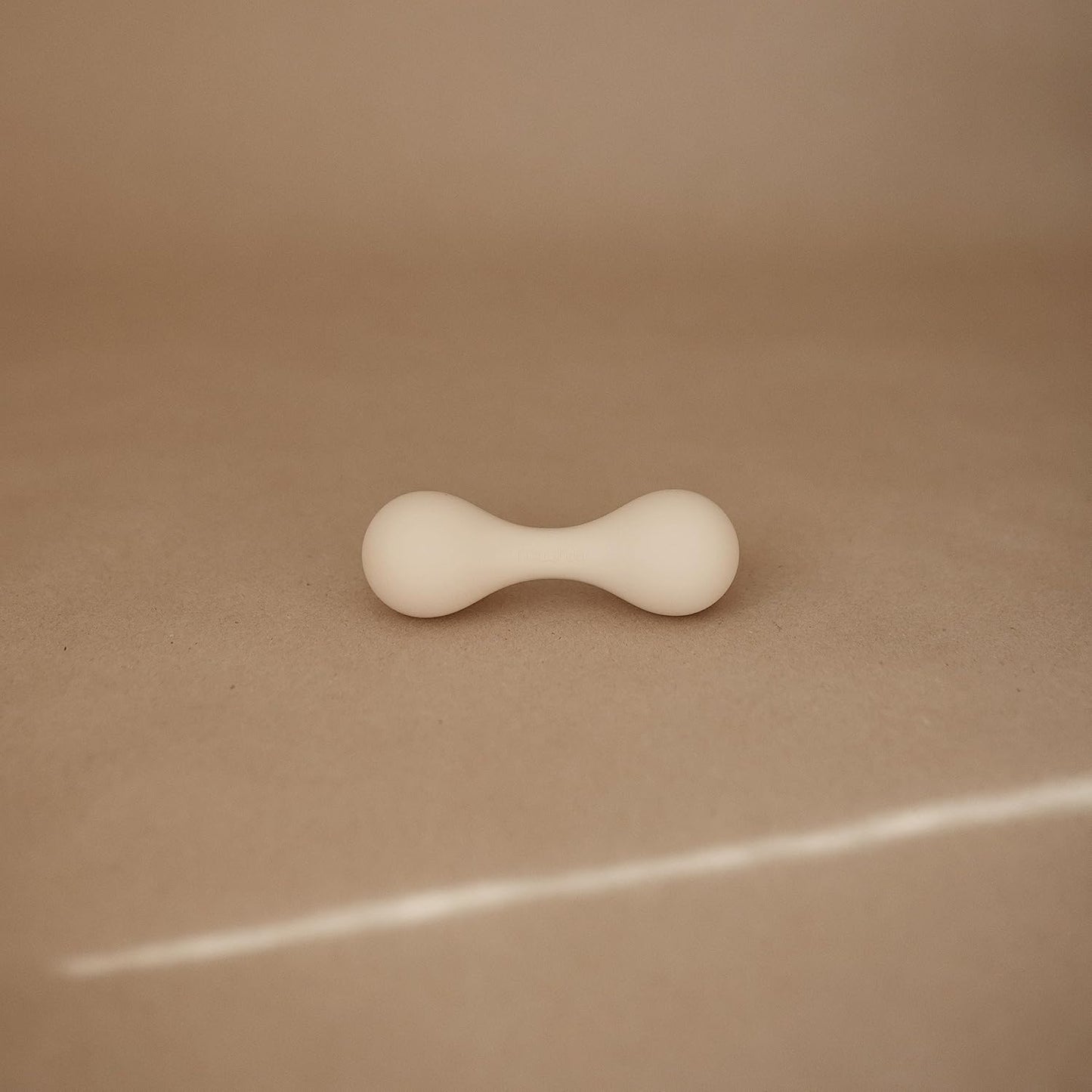 mushie Silicone Baby Shaker Rattle Toy | Ages 3+ Months (Shifting Sand)